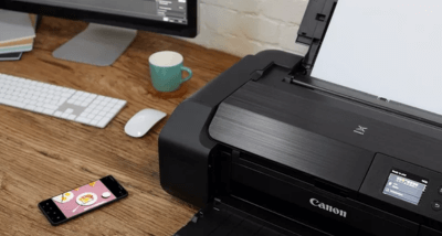 canon-pixma-200s-lifestyle Canon PIXMA PRO-200S on a desk printing from a mobile phone