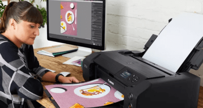 canon-pixma-200s-woman-using Canon PIXMA PRO-200S printing a photo for a photgrapher