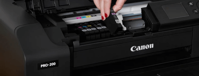 canon-pro-200-ink Canon Pro 200 Printer Being Loaded With Ink