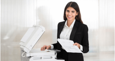 Happy Woman Using A Printer