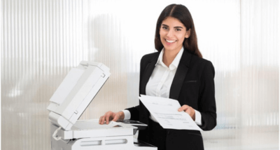 why-is-my-printer-offline-outro-image Happy Woman Using A Printer
